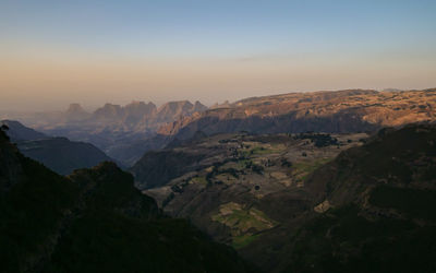 Scenic view of mountains against sky during sunset