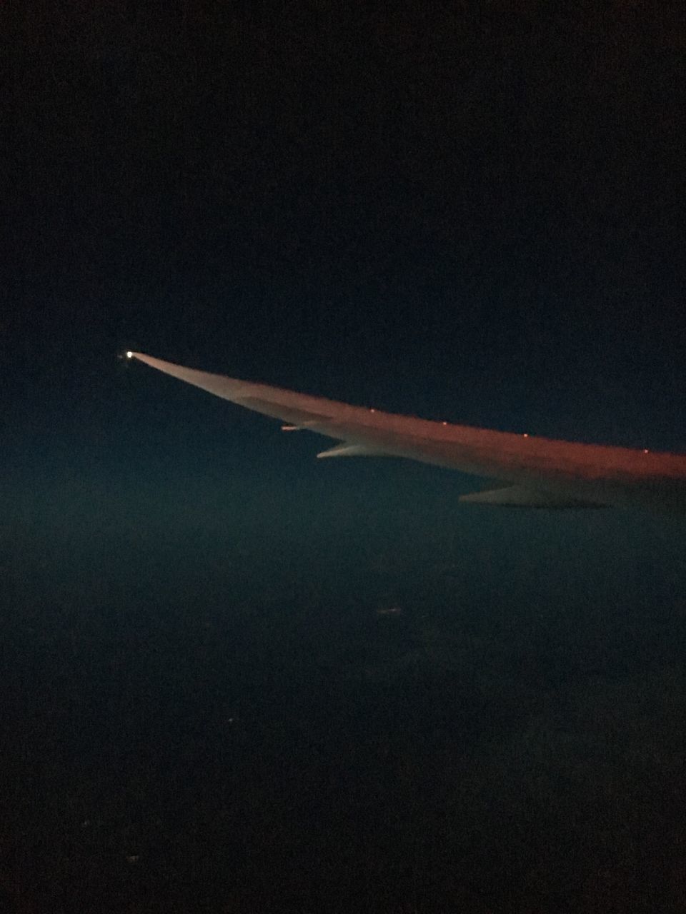 AIRPLANE WING IN SKY