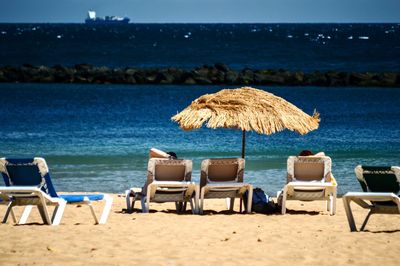 Deck chairs on beach