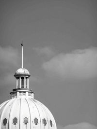 High section of building against cloudy sky