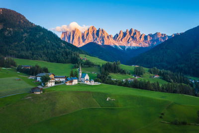 Scenic view of landscape and mountains against sky