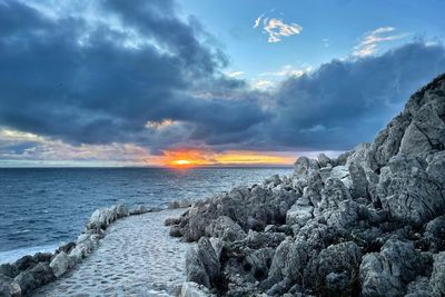 Scenic view of sea against sky during sunset