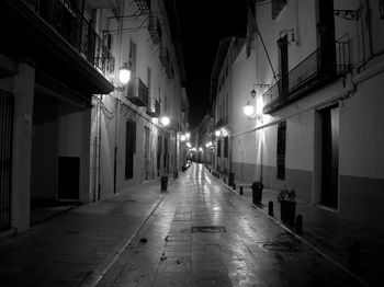 Illuminated street at night