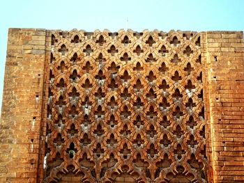 Low angle view of brick wall