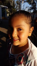 Portrait of smiling girl outdoors