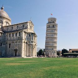 Low angle view of leaning tower of pisa against sky