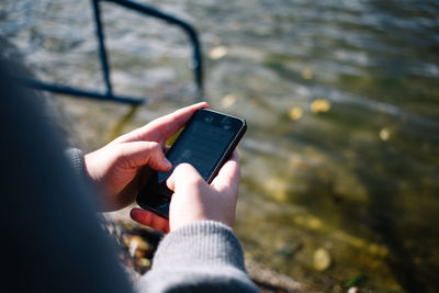 Close-up of person using mobile phone