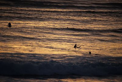Scenic view of sea at sunset