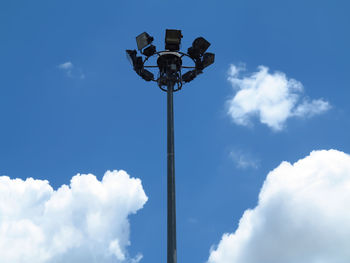 Low angle view of street light against sky