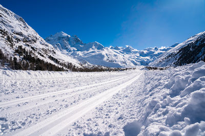 Val roseg, in engadine, switzerland, in winter, with snow-covered cross-country ski slopes.