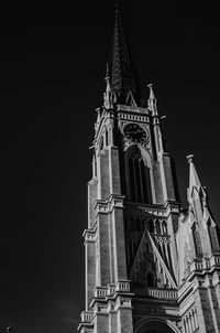 Low angle view of tower at night