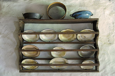 Close-up of old shoes on rack