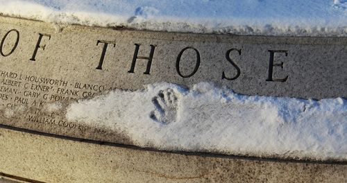 High angle view of text on snow