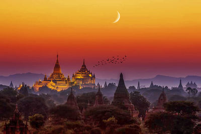 Temple against sky during sunset