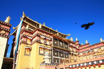 Low angle view of buildings against sky