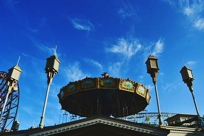 Low angle view of built structure against blue sky