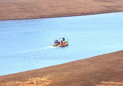 View of boating in calm lake