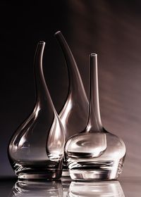 Close-up of wineglass against black background