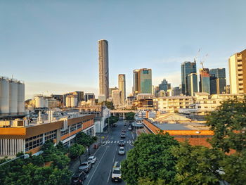 High angle view of street amidst buildings against sky