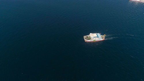 High angle view of illuminated ship on sea