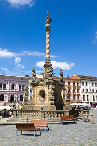 Statue of historic building against sky