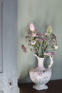 Flowers in old jug