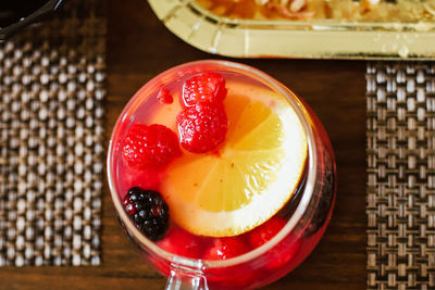 High angle view of fruits in glass on table