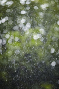 Full frame shot of wet glass during rainy season