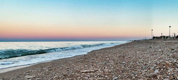 Scenic view of sea at sunset