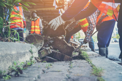 Low section of people working at construction site