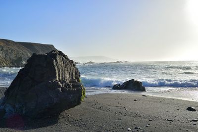 Scenic view of sea against clear sky