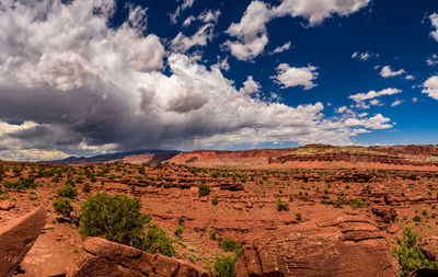 Scenic view of capitol reef national park against cloudy sky