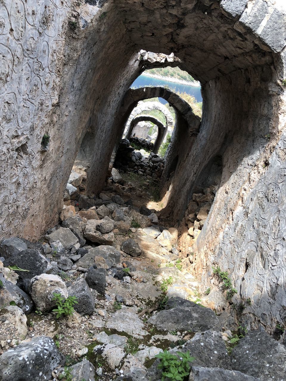 OLD STONE WALL WITH TUNNEL