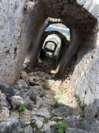 Old stone wall of tunnel