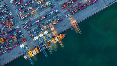 High angle view of commercial dock by sea