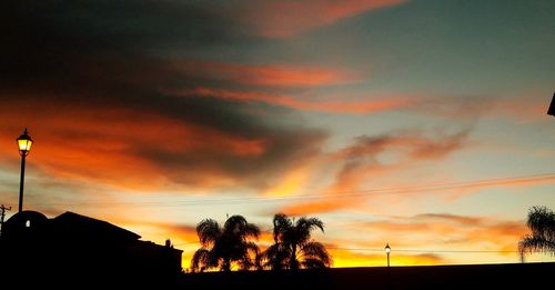 Low angle view of dramatic sky during sunset