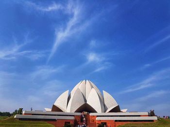 Low angle view of building against blue sky