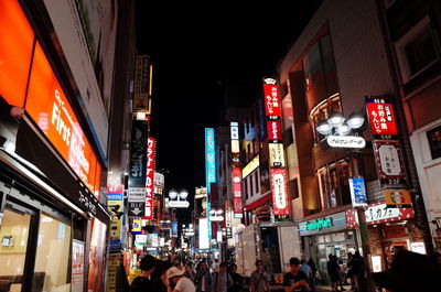 Low angle view of illuminated buildings at night