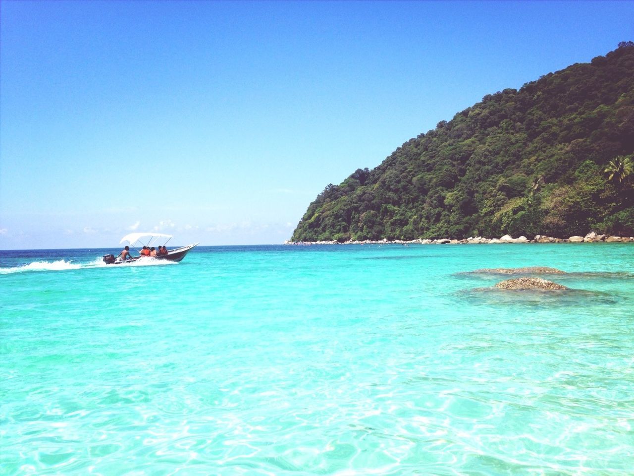 water, sea, blue, nautical vessel, clear sky, waterfront, transportation, boat, tranquil scene, scenics, mode of transport, beauty in nature, tranquility, copy space, nature, mountain, rippled, horizon over water, idyllic, turquoise colored