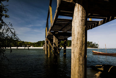 Pier over sea against sky