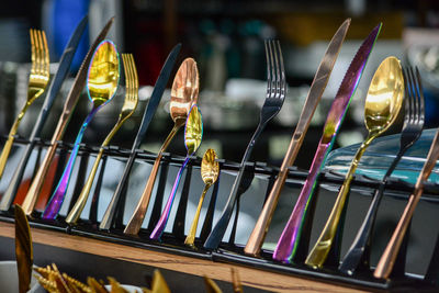 Close-up of forks, knifes and spoons in store