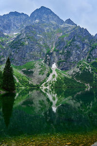 Mountains range near beautiful lake. tatra national park in poland. morskie oko or sea eye lake