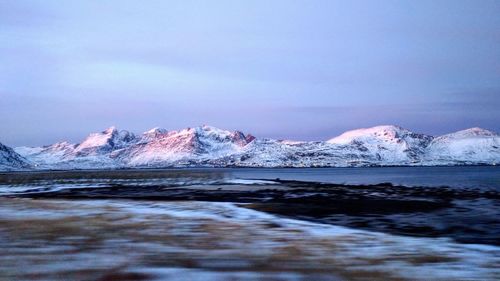 Scenic view of sea against sky during winter