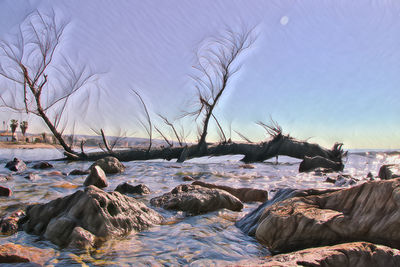 Scenic view of sea against sky during winter