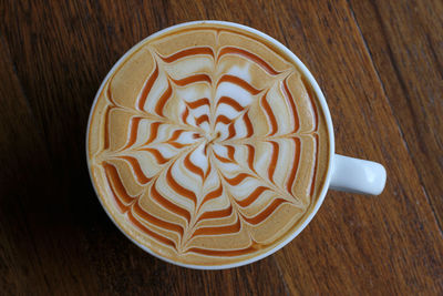 High angle view of cappuccino on table