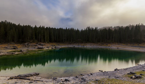 Scenic view of lake against sky in dolomites mountains 