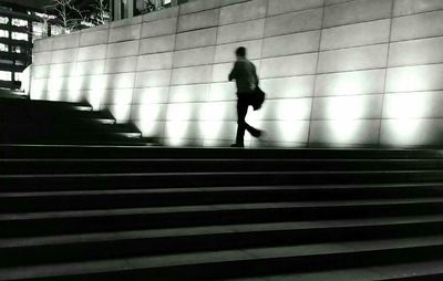 Woman walking on steps