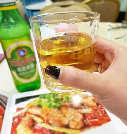 Close-up of woman holding drink