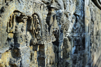 Close-up of carving on stone wall