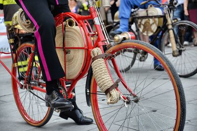 Low section of person sitting on bicycle